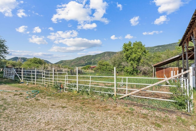 455 E Boulderville Rd, Oakley, UT 84055 - view of yard with a mountain view, an exterior structure, and a view of rural / pastoral area