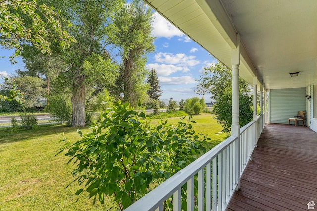 455 E Boulderville Rd, Oakley, UT 84055 - wooden porch with a lawn