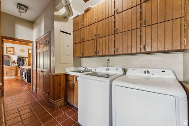 455 E Boulderville Rd, Oakley, UT 84055 - laundry area with cabinet space, washer and clothes dryer, and dark tile patterned flooring