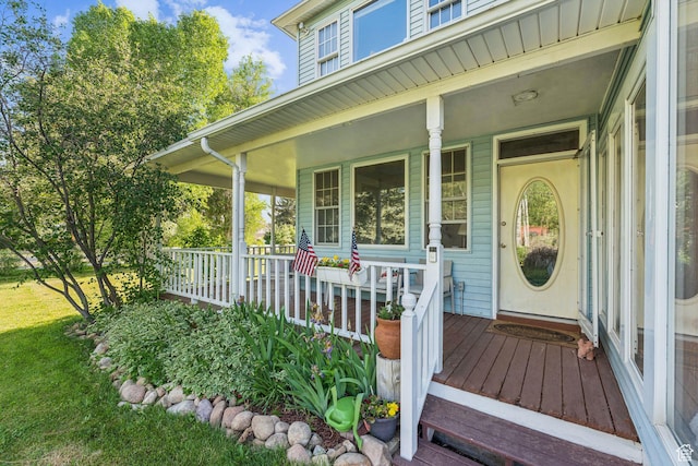 455 E Boulderville Rd, Oakley, UT 84055 - property entrance with covered porch and a lawn