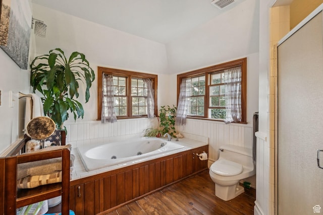 455 E Boulderville Rd, Oakley, UT 84055 - full bath featuring wood finished floors, a tub with jets, a stall shower, and wainscoting