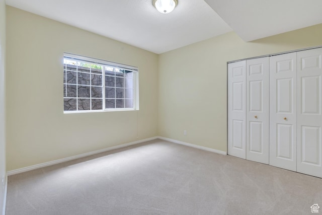 1125 E 740 S, Pleasant Grove, UT 84062 - unfurnished bedroom featuring carpet and a closet