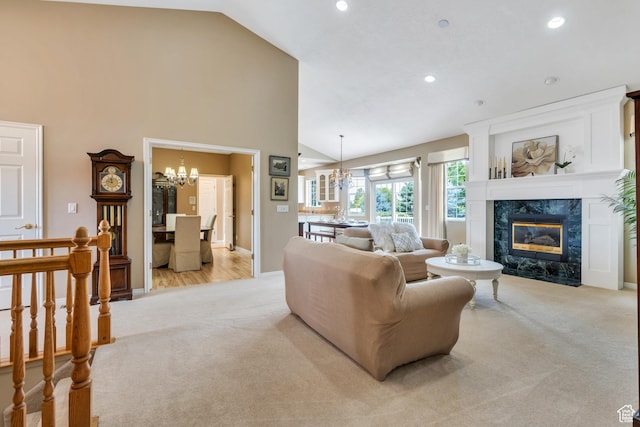 1125 E 740 S, Pleasant Grove, UT 84062 - living area with light colored carpet, a chandelier, a high end fireplace, recessed lighting, and high vaulted ceiling