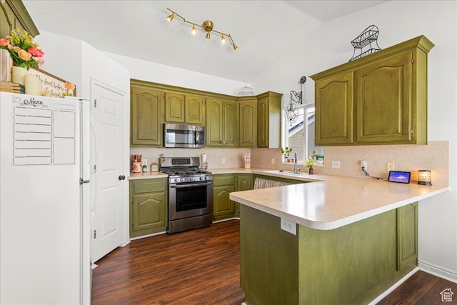 14133 S Lowe Peak Cir, Riverton, UT 84096 - kitchen featuring stainless steel appliances, a peninsula, light countertops, dark wood finished floors, and backsplash