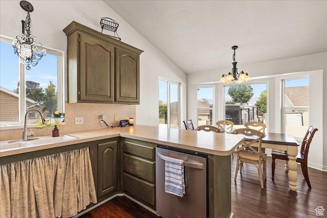 14133 S Lowe Peak Cir, Riverton, UT 84096 - kitchen featuring a chandelier, lofted ceiling, light countertops, dark wood-type flooring, and healthy amount of natural light