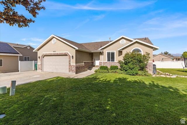 14133 S Lowe Peak Cir, Riverton, UT 84096 - ranch-style house featuring stucco siding, an attached garage, concrete driveway, and brick siding