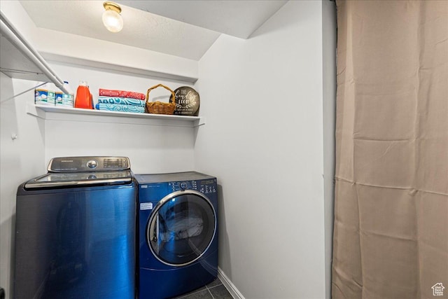 14133 S Lowe Peak Cir, Riverton, UT 84096 - washroom with washer and dryer and baseboards
