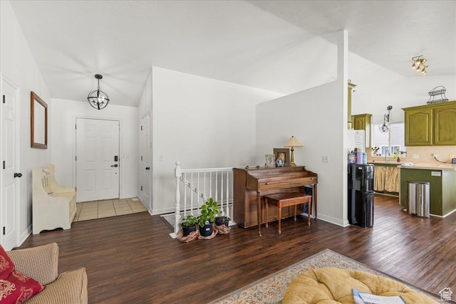 14133 S Lowe Peak Cir, Riverton, UT 84096 - living room with vaulted ceiling and dark wood-style flooring