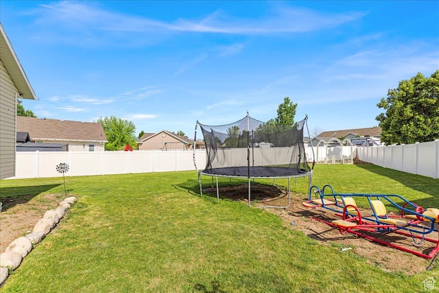 14133 S Lowe Peak Cir, Riverton, UT 84096 - fenced backyard featuring a trampoline