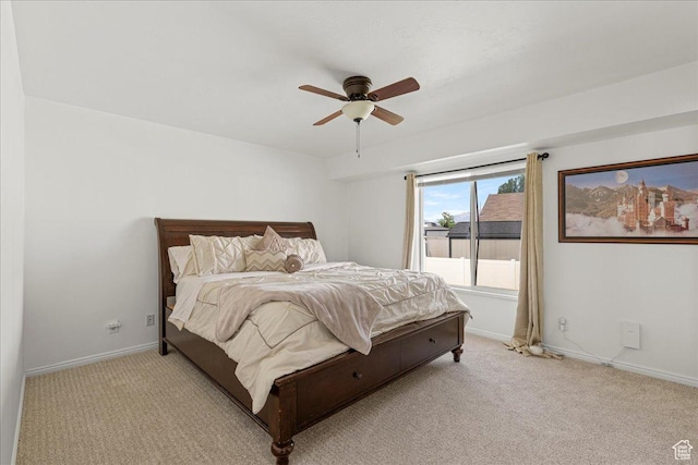 14133 S Lowe Peak Cir, Riverton, UT 84096 - bedroom featuring light colored carpet and a ceiling fan