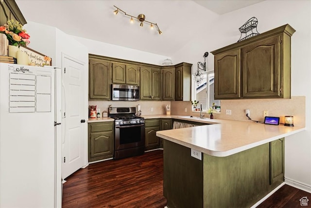 14133 S Lowe Peak Cir, Riverton, UT 84096 - kitchen featuring stainless steel appliances, a peninsula, light countertops, dark wood-style flooring, and dark brown cabinetry