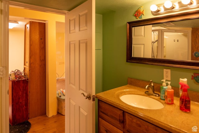 6867 S 1520 W, West Jordan, UT 84084 - bathroom featuring wood finished floors and vanity