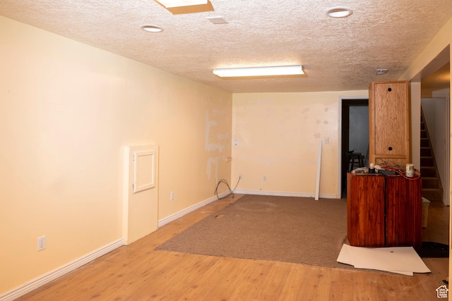 6867 S 1520 W, West Jordan, UT 84084 - spare room featuring stairway, a textured ceiling, wood finished floors, and recessed lighting