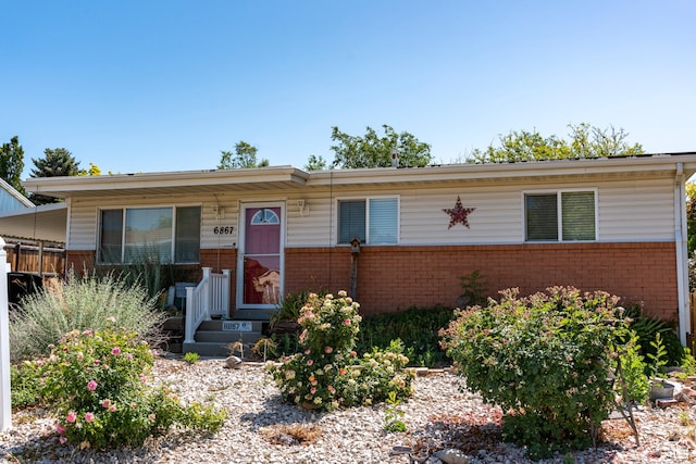 6867 S 1520 W, West Jordan, UT 84084 - ranch-style house featuring brick siding