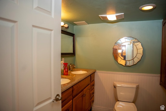 6867 S 1520 W, West Jordan, UT 84084 - bathroom with wainscoting and double vanity