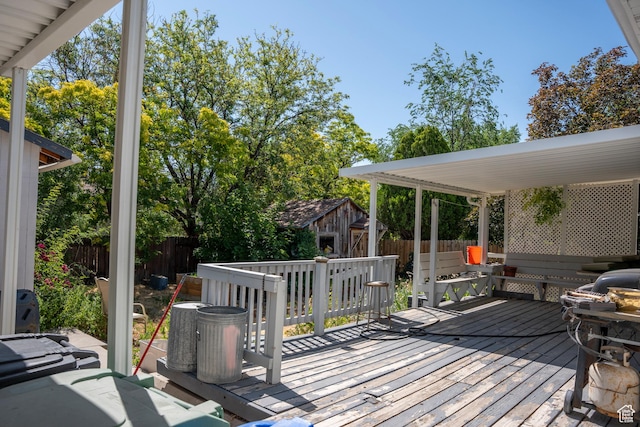 6867 S 1520 W, West Jordan, UT 84084 - wooden deck with a fenced backyard and an outdoor structure