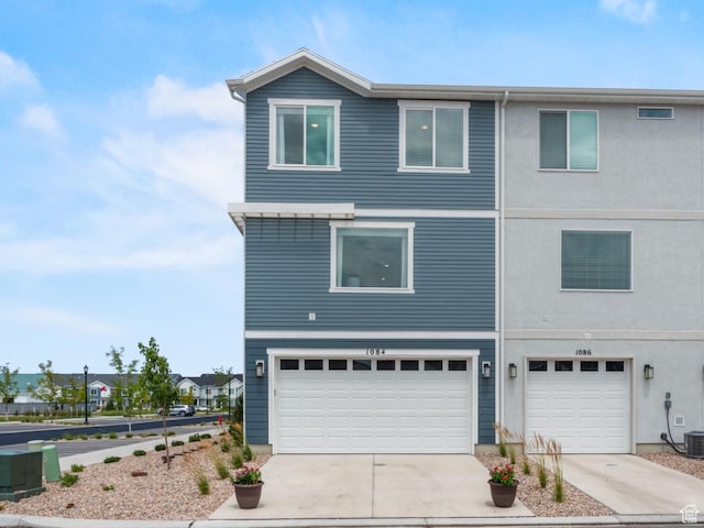 1288 N 375 E Unit 147, Harrisville, UT 84404 - view of front of home with a garage and driveway