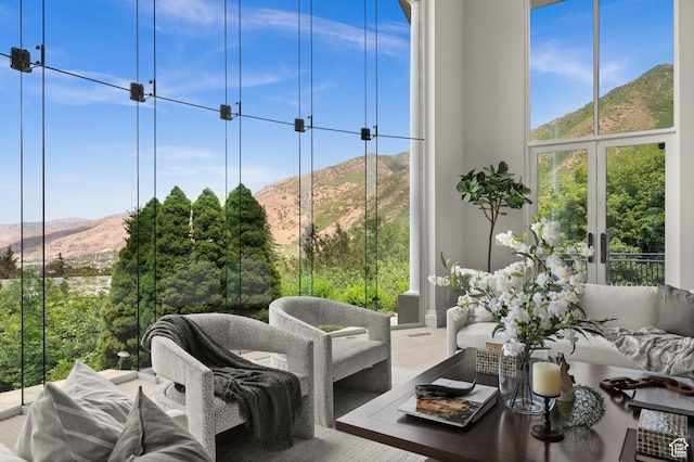 4504 S Abinadi Rd E, Millcreek, UT 84124 - living room with a mountain view, healthy amount of natural light, and floor to ceiling windows