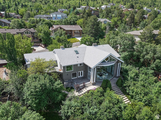 4504 S Abinadi Rd E, Millcreek, UT 84124 - aerial perspective of suburban area featuring a heavily wooded area