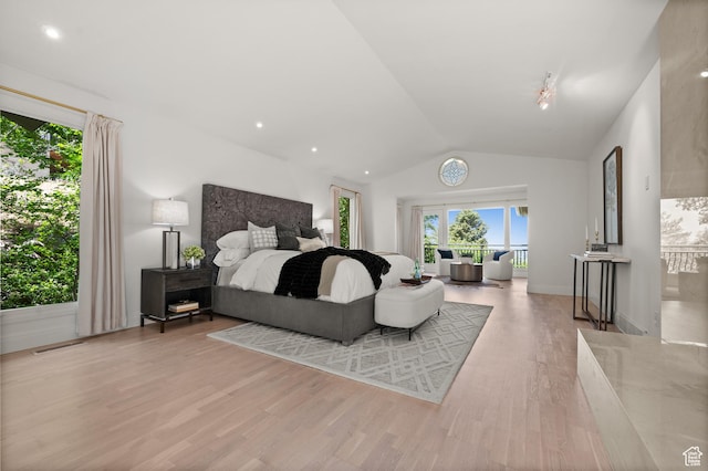 4504 S Abinadi Rd E, Millcreek, UT 84124 - bedroom with vaulted ceiling and wood finished floors