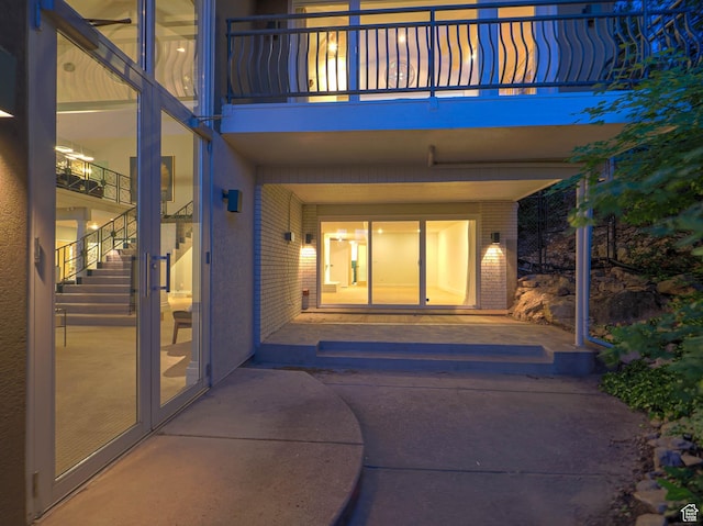 4504 S Abinadi Rd E, Millcreek, UT 84124 - entrance to property with brick siding and a balcony