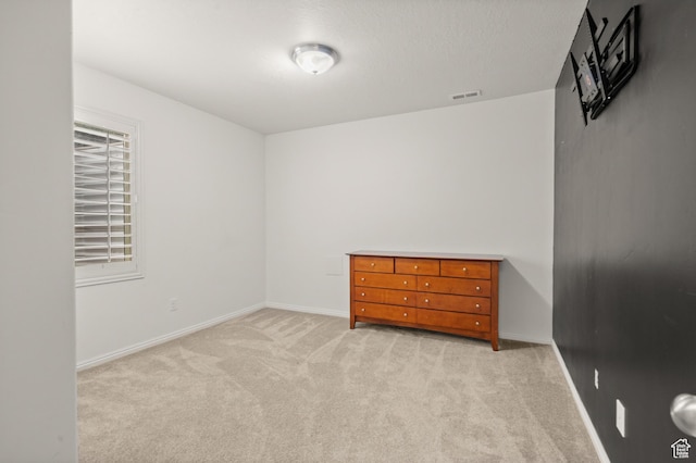 855 E Snap Dragon Ln, Fruit Heights, UT 84037 - unfurnished bedroom featuring light carpet and baseboards
