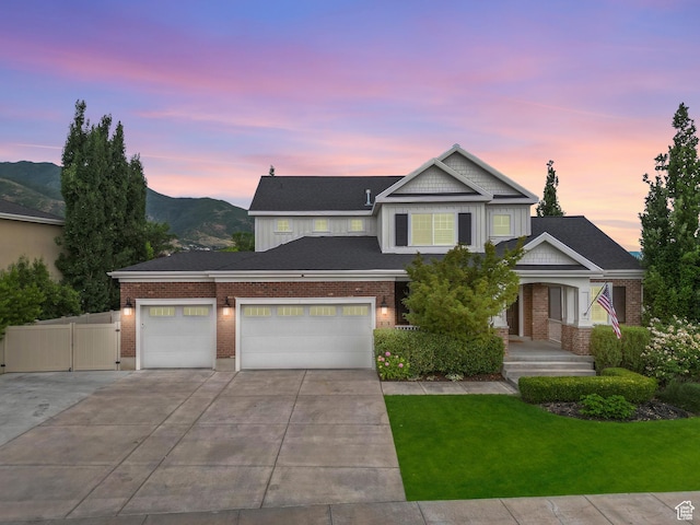 855 E Snap Dragon Ln, Fruit Heights, UT 84037 - view of front of property with concrete driveway, an attached garage, brick siding, and board and batten siding