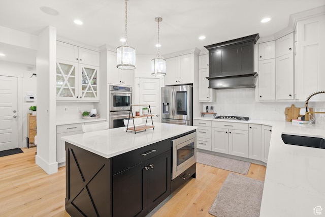 855 E Snap Dragon Ln, Fruit Heights, UT 84037 - kitchen with appliances with stainless steel finishes, dark cabinets, white cabinetry, a kitchen island, and recessed lighting