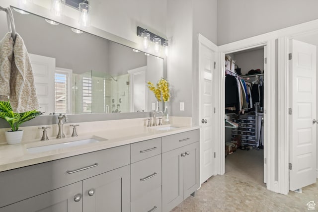 855 E Snap Dragon Ln, Fruit Heights, UT 84037 - full bathroom with a shower stall, double vanity, and a spacious closet