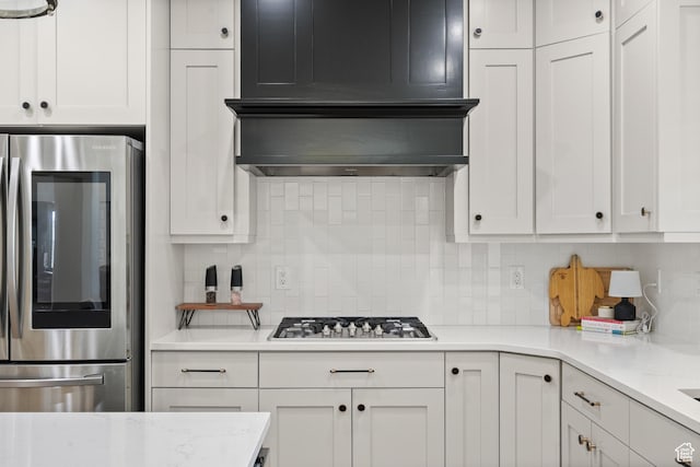 855 E Snap Dragon Ln, Fruit Heights, UT 84037 - kitchen featuring smart refrigerator, stainless steel gas stovetop, tasteful backsplash, and white cabinetry