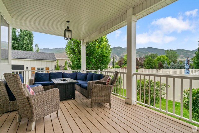 855 E Snap Dragon Ln, Fruit Heights, UT 84037 - wooden terrace with outdoor lounge area and a mountain view