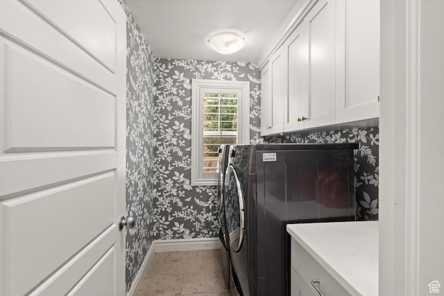 855 E Snap Dragon Ln, Fruit Heights, UT 84037 - laundry area with wallpapered walls, cabinet space, and washer / clothes dryer