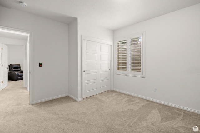 855 E Snap Dragon Ln, Fruit Heights, UT 84037 - unfurnished bedroom with light carpet and a closet
