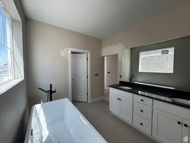 835 S 950 W Unit 124, Springville, UT 84663 - full bath with a soaking tub, healthy amount of natural light, and tile patterned flooring