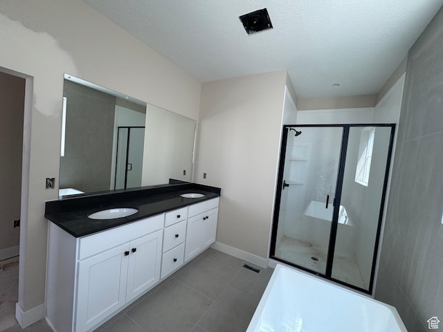 835 S 950 W Unit 124, Springville, UT 84663 - full bath featuring double vanity, a stall shower, a textured ceiling, and tile patterned flooring