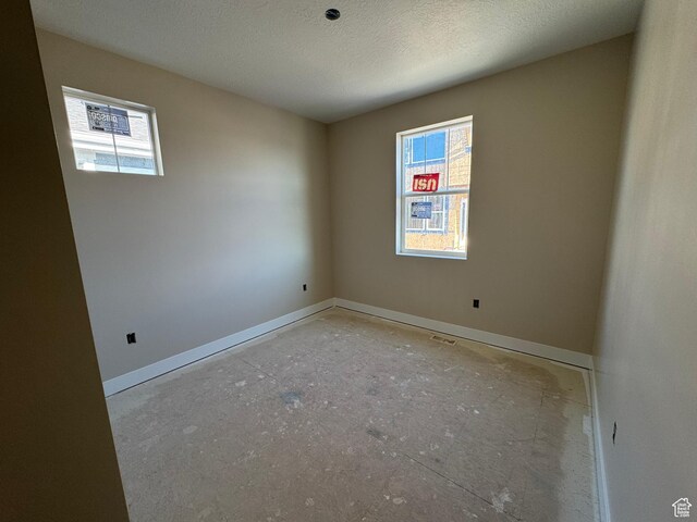 835 S 950 W Unit 124, Springville, UT 84663 - unfurnished room featuring plenty of natural light and a textured ceiling