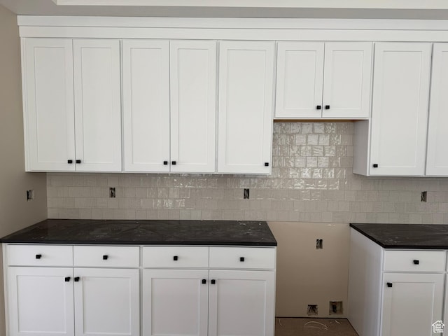 835 S 950 W Unit 124, Springville, UT 84663 - kitchen with white cabinetry, decorative backsplash, and dark stone countertops