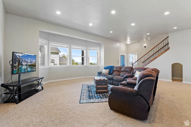 1922 N 1550 E, Provo, UT 84604 - living room featuring carpet flooring, recessed lighting, arched walkways, and stairs