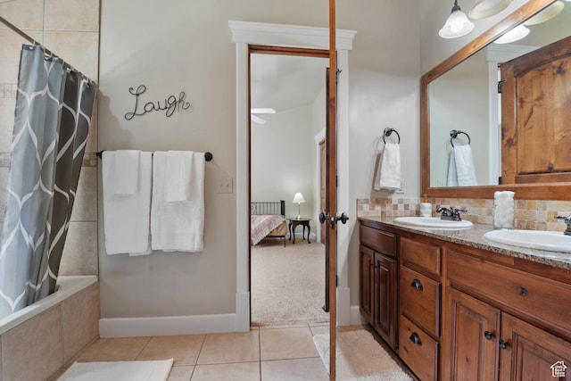 1922 N 1550 E, Provo, UT 84604 - full bath featuring ensuite bathroom, double vanity, tile patterned flooring, tiled shower / bath, and decorative backsplash