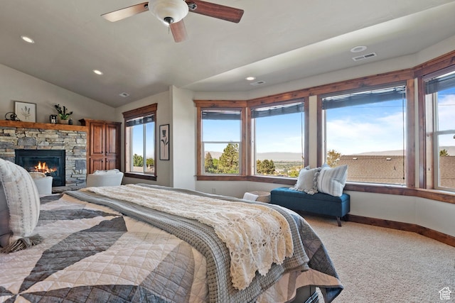 1922 N 1550 E, Provo, UT 84604 - carpeted bedroom featuring a stone fireplace, recessed lighting, lofted ceiling, and ceiling fan