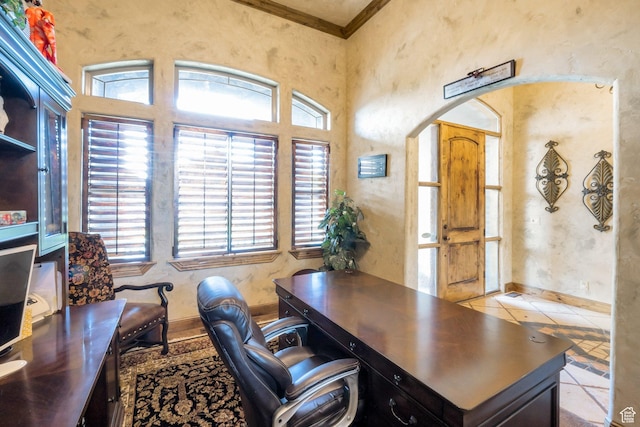 11273 S Alisa Meadows Dr, South Jordan, UT 84095 - tiled home office with plenty of natural light, crown molding, and arched walkways