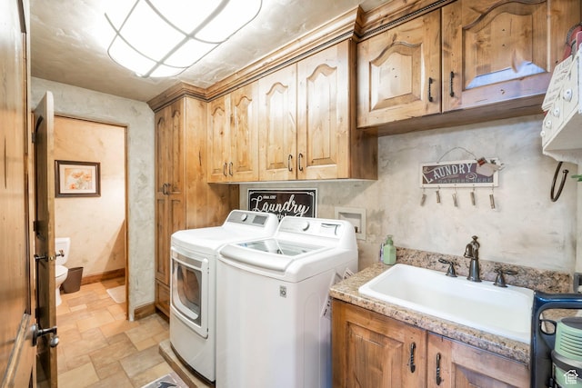 11273 S Alisa Meadows Dr, South Jordan, UT 84095 - laundry room featuring cabinet space, washer and clothes dryer, and stone finish floors