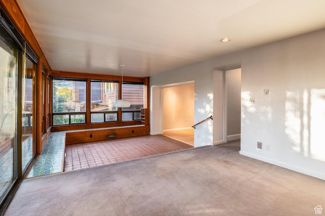 116 S University St E, Salt Lake City, UT 84102 - unfurnished sunroom with carpet floors, recessed lighting, and tile patterned flooring