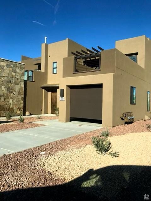 4895 N Fishers Island Way, St George, UT 84770 - view of front of home featuring stucco siding and an attached garage