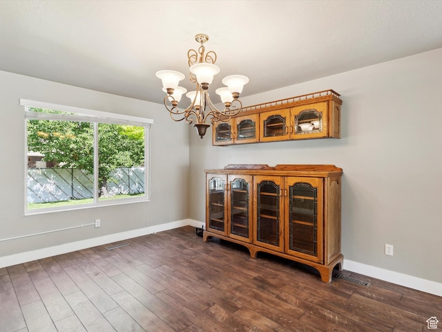 2203 N Joni Dr E, Layton, UT 84040 - dining area with a chandelier and dark wood-type flooring