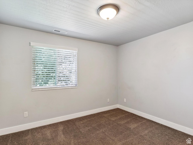 2203 N Joni Dr E, Layton, UT 84040 - spare room with dark colored carpet