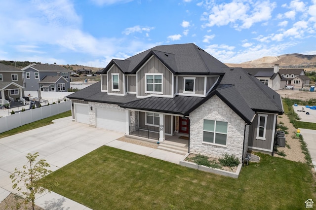 3862 W Lucerne Way, Lehi, UT 84043 - view of front facade with stone siding, concrete driveway, board and batten siding, covered porch, and a standing seam roof