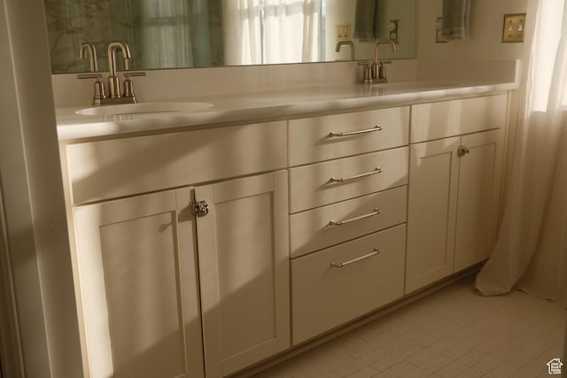 5071 N Oak Creek Dr, Eagle Mountain, UT 84005 - bathroom with double vanity and tile patterned floors