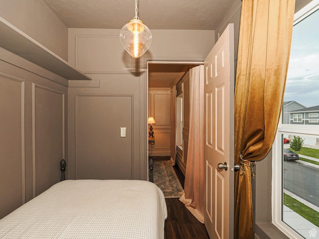 5071 N Oak Creek Dr, Eagle Mountain, UT 84005 - bedroom with dark wood-style flooring