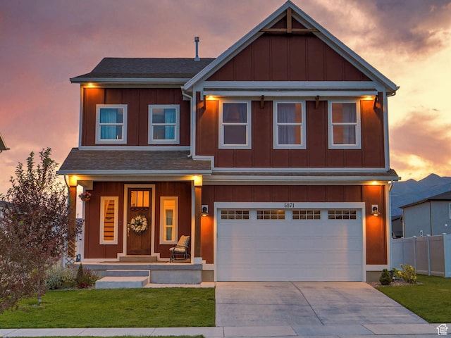 5071 N Oak Creek Dr, Eagle Mountain, UT 84005 - craftsman inspired home with board and batten siding, a porch, driveway, and an attached garage